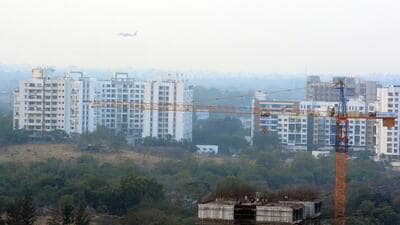 Pune, India - Dec. 1, 2018:An aero plane flying over the buildings (For illustration Purpose only) in Pune, India, on Saturday, December 1, 2018. (Photo by Shankar Narayan/HT PHOTO)
