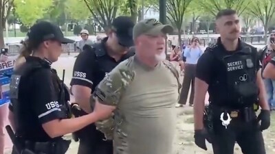 Jay Carey was arrested for burning the American flag outside the White House after President Trump's executive order on flag burning. (Screenshot/ X) Jay Carey was arrested for burning the American flag outside the White House after President Trump's executive order on flag burning. (Screenshot/ X)