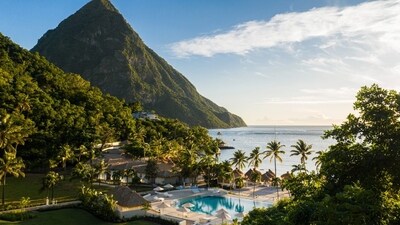 St. Lucia’s pitons loom over Sugar Beach, a Viceroy Resort. St. Lucia’s pitons loom over Sugar Beach, a Viceroy Resort.