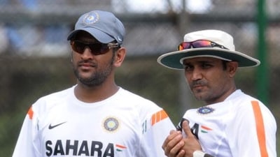 Virender Sehwag, right, fought for Manoj Tiwary, when even MS Dhoni, left, did not have the confidence in him (AFP) Virender Sehwag, right, fought for Manoj Tiwary, when even MS Dhoni, left, did not have the confidence in him (AFP)