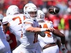 Arch Manning #16 of the Texas Longhorns throws a first-half pass while playing the Ohio State Buckeyes Arch Manning #16 of the Texas Longhorns throws a first-half pass while playing the Ohio State Buckeyes