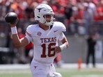 Texas Longhorns quarterback Arch Manning (16) drops back to pass against the Ohio State Buckeyes 