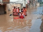 Stranded residents being rescued in Ambala on Friday. (HT) Stranded residents being rescued in Ambala on Friday. (HT)