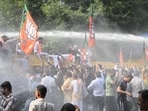 Water cannons being used to disperse BJP workers in New Delhi on Saturday. (Sonu Mehta/HT Photo) Water cannons being used to disperse BJP workers in New Delhi on Saturday. (Sonu Mehta/HT Photo)