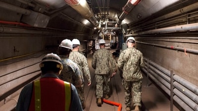 Rear Adm. John Korka, Commander, Naval Facilities Engineering Systems Command (NAVFAC), and Chief of Civil Engineers, leads Navy and civilian water quality recovery experts through the tunnels of the Red Hill Bulk Fuel Storage Facility, near Pearl Harbor, Hawaii, on Dec. 23, 2021. (AP File) Rear Adm. John Korka, Commander, Naval Facilities Engineering Systems Command (NAVFAC), and Chief of Civil Engineers, leads Navy and civilian water quality recovery experts through the tunnels of the Red Hill Bulk Fuel Storage Facility, near Pearl Harbor, Hawaii, on Dec. 23, 2021. (AP File)