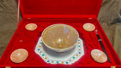 In this image via PMO, a large brown moonstone bowl with four smaller ones and silver chopsticks that were gifted by Prime Minister Narendra Modi to his Japanese counterpart Shigeru Ishiba during his visit to the country. (PMO) In this image via PMO, a large brown moonstone bowl with four smaller ones and silver chopsticks that were gifted by Prime Minister Narendra Modi to his Japanese counterpart Shigeru Ishiba during his visit to the country. (PMO)