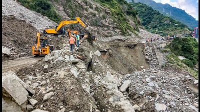 Repair and restoration work underway after a landslide damaged part of Kiratpur-Manali Highway near Pandoh, in Mandi district, Himachal Pradesh, on Saturday. (PTI) Repair and restoration work underway after a landslide damaged part of Kiratpur-Manali Highway near Pandoh, in Mandi district, Himachal Pradesh, on Saturday. (PTI)