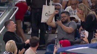 A man proposes to his girlfriend during a US Open match. (US Open - X) A man proposes to his girlfriend during a US Open match. (US Open - X)