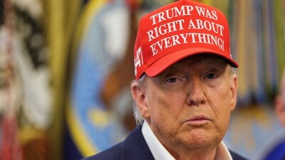 US President Donald Trump wears a 'Trump Was Right About Everything!' hat as he makes an announcement in the Oval Office at the White House in Washington, D.C. (REUTERS File)