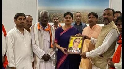 Union minister of state for health and family welfare Anupriya Patel with her party workers in Prayagraj on August 30. (HT photo)