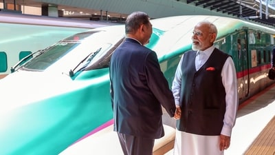 Prime Minister Narendra Modi greets Japan Prime Minister Shigeru Ishiba as the latter accompanies him on a trip in a Shinkansen bullet train from Tokyo to Sendai (PMO/ANI) Prime Minister Narendra Modi greets Japan Prime Minister Shigeru Ishiba as the latter accompanies him on a trip in a Shinkansen bullet train from Tokyo to Sendai (PMO/ANI)