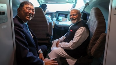 Japanese Prime Minister Shigeru Ishiba and PM Modi smile to take a picture while travelling in a Shinkansen bullet train from Tokyo to Sendai, in Tokyo (PMO/ANI) Japanese Prime Minister Shigeru Ishiba and PM Modi smile to take a picture while travelling in a Shinkansen bullet train from Tokyo to Sendai, in Tokyo (PMO/ANI)