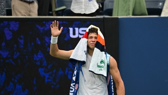 Ben Shelton reacts emotionally after being forced to leave the court and withdraw from the US Open. (AFP)