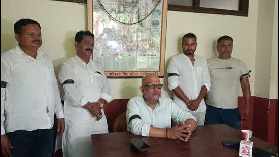 UP Congress president Ajay Rai (seated) sporting a black band (HT Photo)