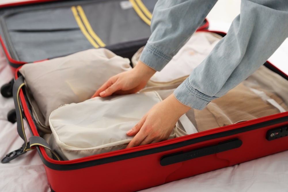 Packing cubes prevent you from turning your suitcase upside down in search of one dress. You can label these cubes too, (Shutterstock) Packing cubes prevent you from turning your suitcase upside down in search of one dress. You can label these cubes too, (Shutterstock)