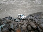An ambulance being pulled out from the Beas river on the Chandigarh-Manali highway on Sunday. (Birbal Sharma/HT) An ambulance being pulled out from the Beas river on the Chandigarh-Manali highway on Sunday. (Birbal Sharma/HT)