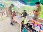 Army personnel helping flood victims at a village in Ferozepur. (HT) Army personnel helping flood victims at a village in Ferozepur. (HT)
