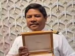 An Emirates employee received an Omega watch for completing 20 years with the airline An Emirates employee received an Omega watch for completing 20 years with the airline