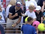 Polish CEO Piotr Szczerek was caught swiping an autographed hat from a child at the US Open.