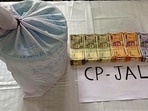 Police recovered 3.5 kg heroin along with <span class='webrupee'>₹</span>2 lakhs in drug money from possession of the accused in Jalandhar on Sunday. (HT Photo) Police recovered 3.5 kg heroin along with <span class='webrupee'>₹</span>2 lakhs in drug money from possession of the accused in Jalandhar on Sunday. (HT Photo)