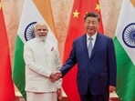PM Narendra Modi and Chinese President Xi Jinping shake hand before their meeting on the sidelines of the SCO summit in Tianjin, China on Sunday