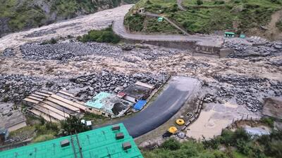 A vital bridge at Tamak Nala in Chamoli district, connecting Jyotirmath with Malari near China border, was completely washed away by a strong river current at 2 am on Sunday. A vital bridge at Tamak Nala in Chamoli district, connecting Jyotirmath with Malari near China border, was completely washed away by a strong river current at 2 am on Sunday.