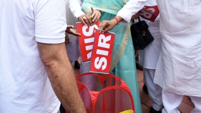 Leader of Opposition in Lok Sabha and Congress MP Rahul Gandhi and other INDIA bloc MPs symbolically tear the SIR and throw it in a dustbin during their protest against Special Intensive Revision (SIR) of electoral rolls in Bihar. (ANI) Leader of Opposition in Lok Sabha and Congress MP Rahul Gandhi and other INDIA bloc MPs symbolically tear the SIR and throw it in a dustbin during their protest against Special Intensive Revision (SIR) of electoral rolls in Bihar. (ANI)