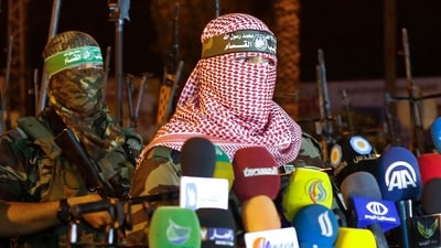 File picture of Abu Obeida (R), spokesman for the armed wing of Hamas, the Ezzedine al-Qassam Brigades. (AFP) File picture of Abu Obeida (R), spokesman for the armed wing of Hamas, the Ezzedine al-Qassam Brigades. (AFP)