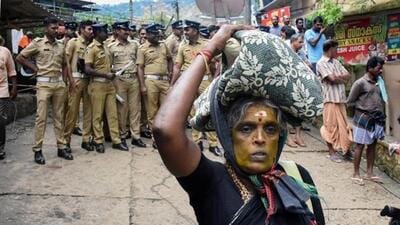 An elderly woman on her way to Sabarimala Temple. (PTI) An elderly woman on her way to Sabarimala Temple. (PTI)