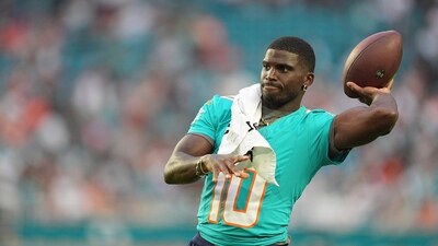 Miami Dolphins wide receiver Tyreek Hill (10) throws the football on the sidelines during the first half of an NFL preseason football game against the Jacksonville Jaguars, Saturday, Aug. 23, 2025, in Miami Gardens, Fla. (AP)