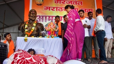 NCP (SP) MP Supriya Sule meets Maratha quota agitation leader Manoj Jarange during his hunger strike for the third day, in Mumbai, Sunday, Aug. 31, 2025. (PTI) NCP (SP) MP Supriya Sule meets Maratha quota agitation leader Manoj Jarange during his hunger strike for the third day, in Mumbai, Sunday, Aug. 31, 2025. (PTI)