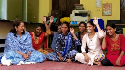 Safeena Husain, left, founder and board member of the Foundation to Educate Girls, talks to a group in Rajasthan, India. (Ramon Magsaysay Award Foundation via AP) Safeena Husain, left, founder and board member of the Foundation to Educate Girls, talks to a group in Rajasthan, India. (Ramon Magsaysay Award Foundation via AP)