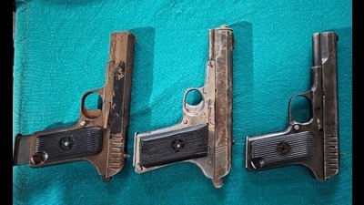 Police teams recovered three .30-bore country-made pistols from the accused. (HT Photo) Police teams recovered three .30-bore country-made pistols from the accused. (HT Photo)