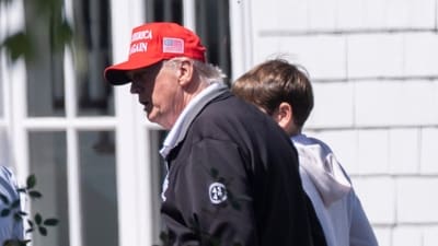 President Donald Trump, from left, walks with his grandson Spencer Trump and his granddaughter Kai Trump at the Trump National Golf Club in Sterling, Va., Saturday, Aug. 30. (AP) President Donald Trump, from left, walks with his grandson Spencer Trump and his granddaughter Kai Trump at the Trump National Golf Club in Sterling, Va., Saturday, Aug. 30. (AP)