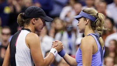 Iga Swiatek, of Poland, left, greets Anna Kalinskaya, of Russia, after winning their match during the third round of the US Open. (AP)