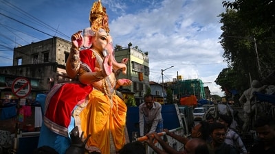 A tractor-trolley overturned during a Ganesh procession in Andhra (PTI)