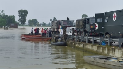 Army personnel during a rescue and evacuation operation at a flood-affected village, in Kapurthala on Saturday. (PTI) Army personnel during a rescue and evacuation operation at a flood-affected village, in Kapurthala on Saturday. (PTI)
