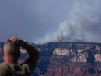 Smoke rises from the Dragon Bravo Fire at the Grand Canyon as seen from Mather Point near Grand Canyon Village, Ariz., Monday, July 28, 2025. AP/PTI(AP07_29_2025_000001B)