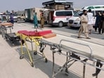 In this photo released by the Nangarhar Media Center, stretchers and ambulances are prepared to receive victims of an earthquake that killed hundreds and destroyed numerous villages in eastern Afghanistan. In this photo released by the Nangarhar Media Center, stretchers and ambulances are prepared to receive victims of an earthquake that killed hundreds and destroyed numerous villages in eastern Afghanistan.