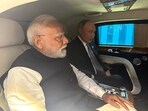Indian Prime Minister Narendra Modi (L) and Russia's President Vladimir Putin leaving together in a car for the venue of their bilateral meeting after attending the SCO Summit in Tianjin. 