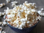 Air-popped popcorn is a healthy replacement for processed foods like chips. Air-popped popcorn is a healthy replacement for processed foods like chips.