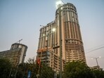 The ex-management, under an NCLT-appointed resolution professional’s supervision, has delivered these units across 16 ongoing projects. (In Photo:  Outside view of a building belonging to Supertech in Noida)