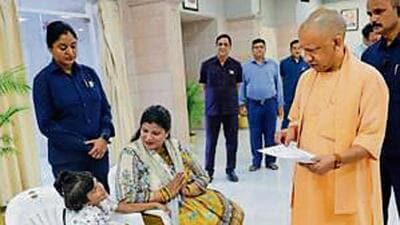 Chief minister Yogi Adityanath meets Mayra and her mother at Janata Darshan in Lucknow on Monday. (HT) Chief minister Yogi Adityanath meets Mayra and her mother at Janata Darshan in Lucknow on Monday. (HT)