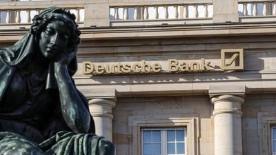 The logo of German giant Deutsche Bank is seen on one of their branches in Frankfurt am Main, western Germany. (AP)