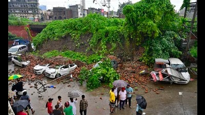 Five cars parked alongside Domoria Bridge suffered heavy damage after a retaining wall collapsed in Ludhiana on Monday. (Gurpreet Singh/HT) Five cars parked alongside Domoria Bridge suffered heavy damage after a retaining wall collapsed in Ludhiana on Monday. (Gurpreet Singh/HT)