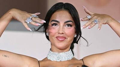 On the red carpet, Georgina flaunted her massive diamond engagement ring, which Cristiano Ronaldo used to propose to her. (AFP) On the red carpet, Georgina flaunted her massive diamond engagement ring, which Cristiano Ronaldo used to propose to her. (AFP)