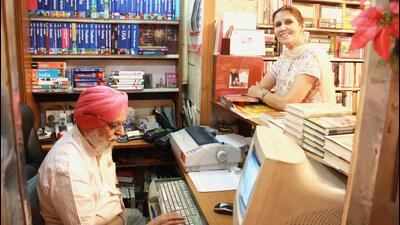 K.D. Singh himself would sit behind the bookstore’s counter (seen in the photo with wife Nini), which he referred to as his “Boat Club” (HT) K.D. Singh himself would sit behind the bookstore’s counter (seen in the photo with wife Nini), which he referred to as his “Boat Club” (HT)