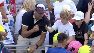 Polish CEO Piotr Szczerek was caught swiping an autographed hat from a child at the US Open. (X) Polish CEO Piotr Szczerek was caught swiping an autographed hat from a child at the US Open. (X)