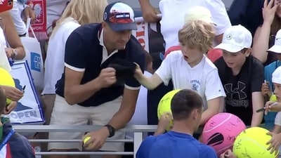 Polish CEO Piotr Szczerek was caught swiping an autographed hat from a child at the US Open. Polish CEO Piotr Szczerek was caught swiping an autographed hat from a child at the US Open.