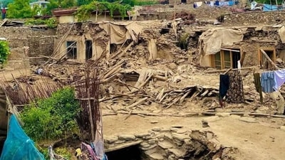 A portion of land is seen to have caved as houses stand crushed after an earthquake jittered Afghanistan on Monday, killing hundreds and injuring several others. (From Taliban spox Suhail Shaheen)